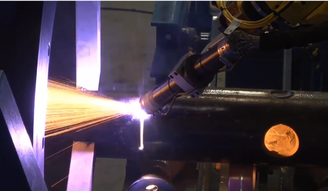 Precision robotic welding with bright arc in controlled prefabrication facility